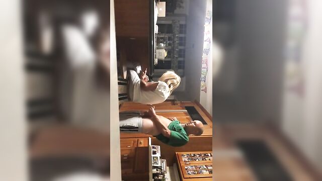 Son jerks off behind mom's back and cums - 2 image