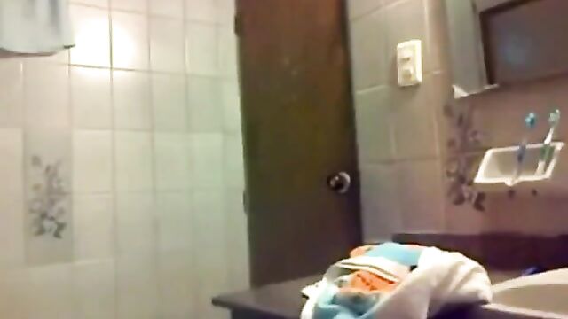 Real sister records herself dry humping in the bathroom - 1 image