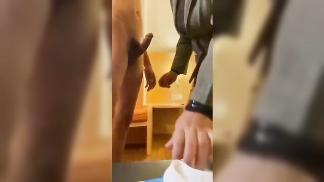 Mother is teaching son how to use a condom - 1 image