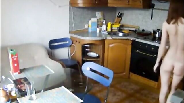 When we stay at our vacation home, my sister walks around naked with a wet pussy all day long - 1 image